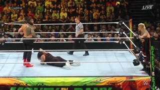 مسابقه کشتی کج اوسوز مقابل رومن رینز و سولو سیکوا